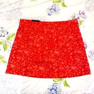 J.LINDEBERG WOMENS AMELIE MID GOLF SKIRT - CAMO RED